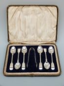 A cased set of six Victorian/ Edward VII hallmarked silver teaspoons and tongs,