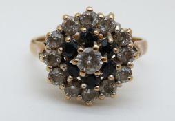 A 9ct gold ring set with sapphires and cubic zirconia (size L)