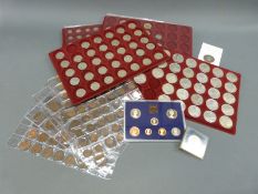 An amateur coin collection including five United Nations £2 coins, two £5 examples etc,