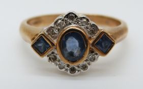 A 9ct gold ring set with an oval sapphire,