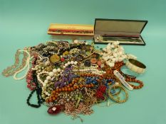 A collection of costume jewellery to include Venetian beaded necklaces, Art Deco,