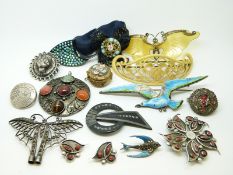 A white metal pendant set with agate cabochons, a Victorian button,