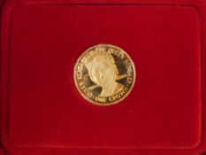 A cased, Pobjoy Mint, Queen Mother 9ct gold one crown coin with certificate,