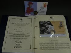 A Queens Golden Jubilee 2002 folder containing 14 crown and stamp covers, includes £5 examples.