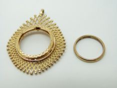 A 9ct gold coin mount and a 9ct gold wedding band, 8.