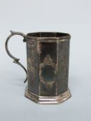 A Victorian hallmarked silver octagonal tankard, London 1840 maker's mark indistinct, height 9cm,