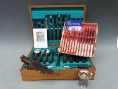 A six-place setting canteen of retro cutlery,