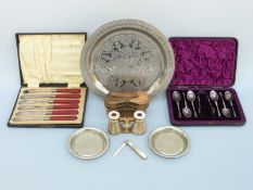 A pair of hallmarked silver sugar tongs with similar plated apostle spoon in case,