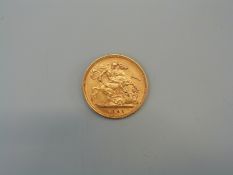A 1893 gold half sovereign.