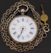 A silver ladies open faced pocket watch with Roman numerals and floral decoration to the white