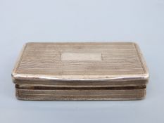 A 19thC French white metal engine turned snuff box, with French silver marks circa mid 19thC,