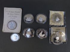 Seven silver proof commemorative coins,