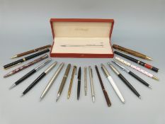 A boxed St Dupont ballpoint pen, Parker etc.