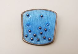 A Norwegian silver brooch set with blue enamel, 3.5 x 3.