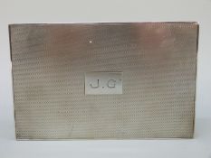 An unusually large George V hallmarked silver matchbox holder,