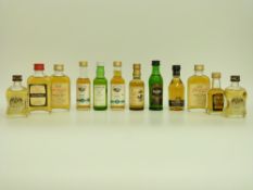 Twelve mainly 5cl single malt whisky miniatures to include Bowmore 10 year, Cardhu 12 year,