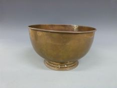 A brass bowl marked HMS Defiant to rim and JWA to base