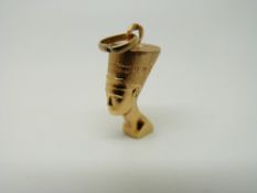An 18ct gold pendant/ charm in the form of an Egyptian head, 4.