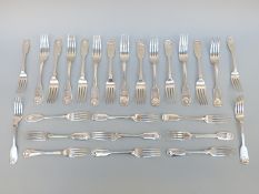 Thirteen Victorian hallmarked silver fiddle and shell pattern table forks, six being Exeter 1866,