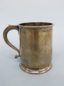 A hallmarked silver tankard, marks rubbed, height 9cm,