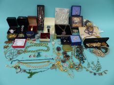 A large collection of costume jewellery including amethyst brooch, rock crystal pendant,