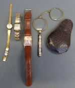 Three various wristwatches comprising Elgin tonneau shaped gold filled wristwatch,