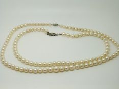 Two single strands of cultured pearls