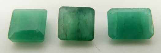 Three emerald cut emeralds the largest approximately 1.