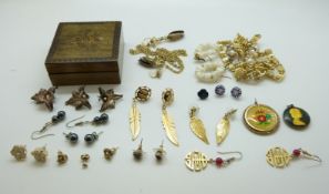 A collection of costume jewellery to include gold plated earrings in the form of leaves, earrings,