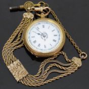 Silver gilt ladies pocket watch with Roman numerals and floral decoration to the white enamel dial,
