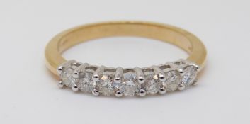 An 18ct gold half eternity ring set with diamonds totalling approximately 0.5ct, 3.