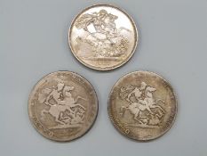 An 1887 Jubilee crown, together with two George III crowns,