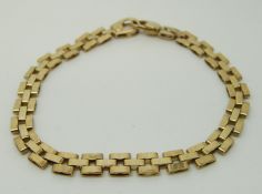 A 9ct gold bracelet made up of rectangular links, 11.
