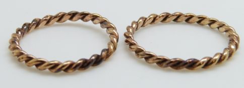 Two yellow metal plaited rings, 2.
