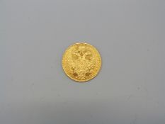 A 1915 Austrian 1 Ducat coin, 3.