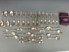 A part canteen of 19thC Elkington silver plated cutlery all bearing the same family crest,