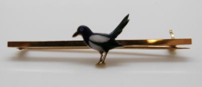 A Victorian brooch in the form of a magpie set with enamel, 5cm, 4.
