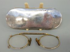 A George V hallmarked silver sprung spectacles case, Birmingham 1923 maker D.