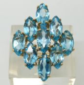 A 9ct gold ring set with blue topaz (size S)