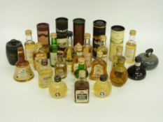 A collection of 26 whisky miniatures, including Tomatin, The Invergordon, Te Bheag, Inverey,