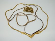 Two 9ct gold ribbon necklaces, a 9ct gold rope twist necklace and a 9ct gold bracelet (11.
