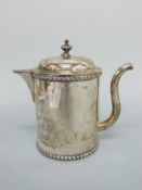 An Asprey George V hallmarked silver Argyle or Argyll with twin spouts and hinged lid, London 1927,