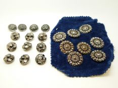A set of seven Victorian cut steel buttons and some similar buttons