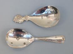 Two Queen Elizabeth II hallmarked silver tea caddy spoon with feature hallmarks,