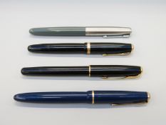 Four Parker fountain pens comprising two Duofold with 14k nibs,