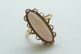 A 9ct gold ring set with an opal cabochon (size P)