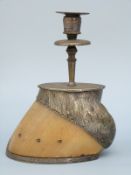 A Rowland Ward mounted hoof candlestick with hinged plated double compartment and plated horseshoe