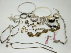 A bracelet set with labradorite cabochons, two silver bracelets, a silver necklace, a silver bangle,