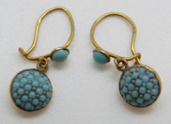 A pair of 9ct gold Edwardian earrings set with turquoise