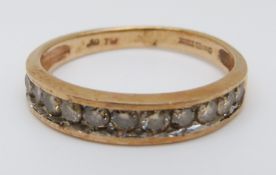 A 9ct gold half eternity ring set with diamonds totalling approximately 0.5ct, 2.